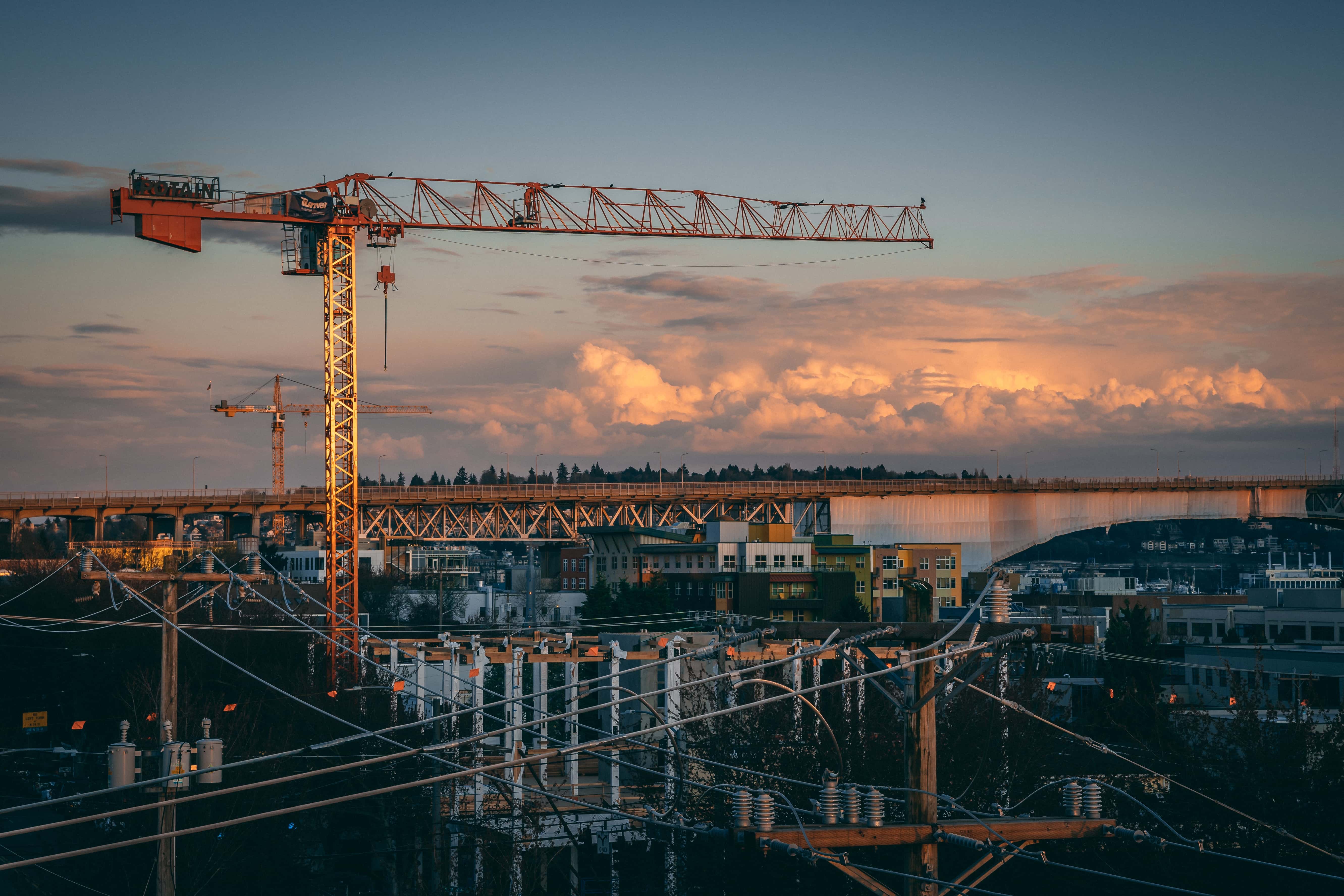 A crane at a construction site. - Jerone Toledo Holding